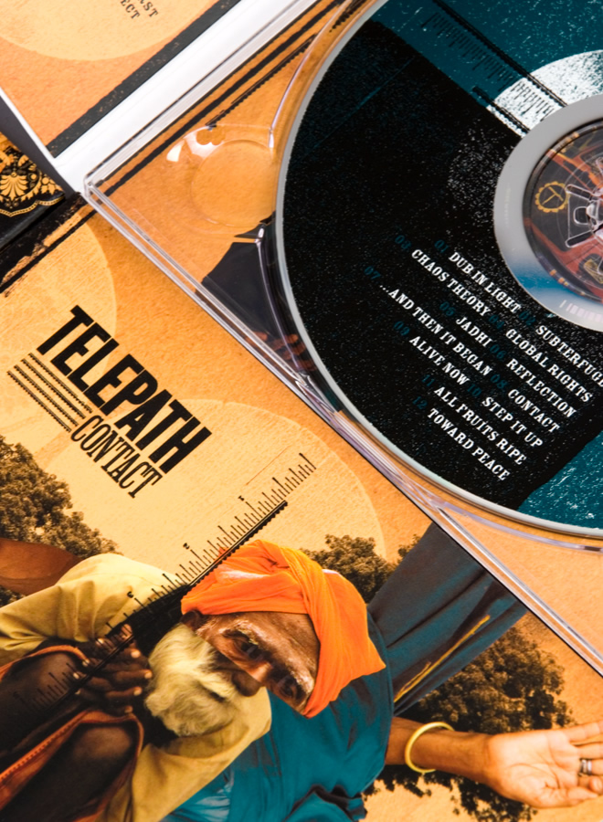 Telepath: Contact digipack inside spread and CD close-up.